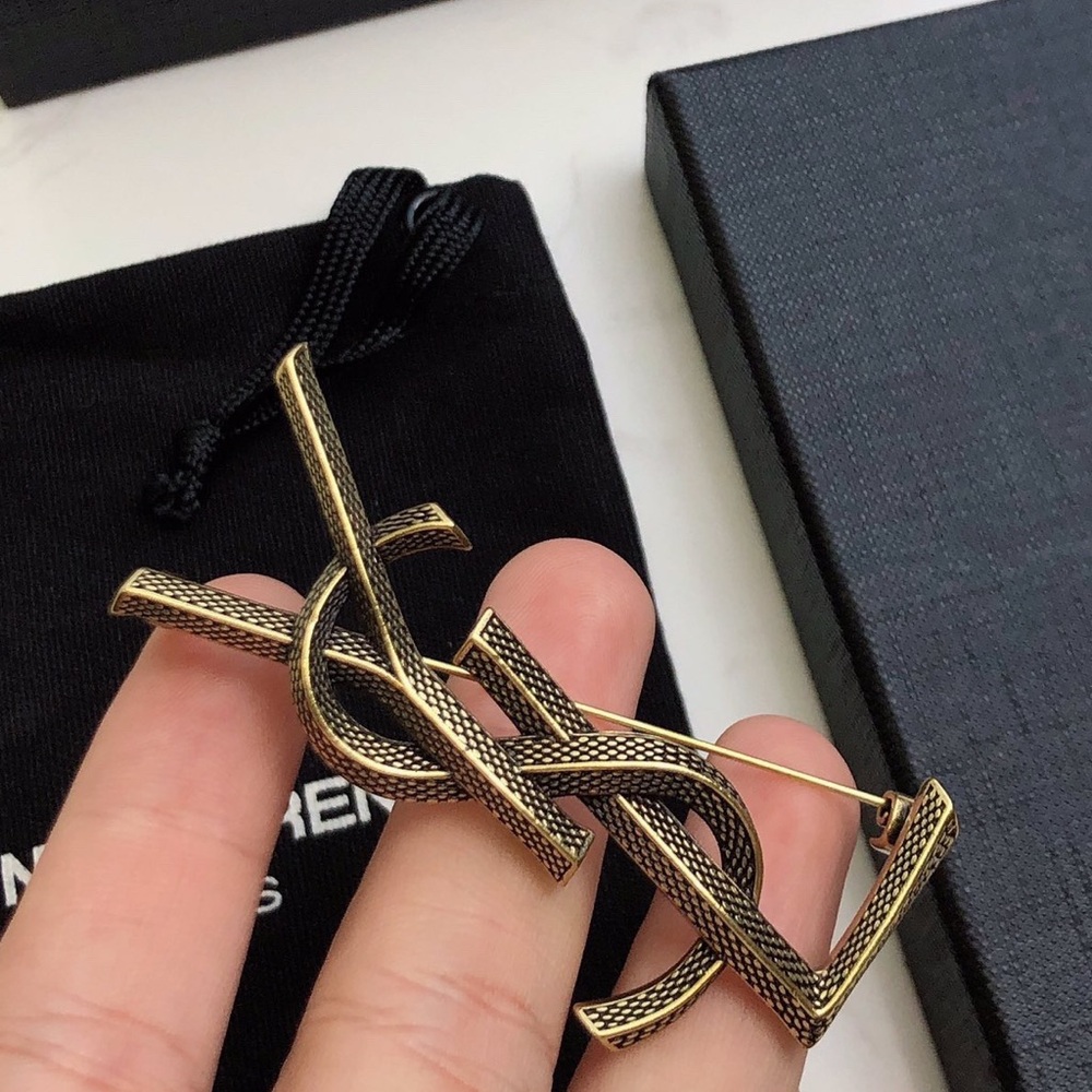 Saint Laurent Black and Gold Intertwined Brooch
